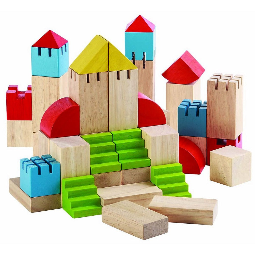 Bauklötze kreativ PlanToys - Mit den bunten kreativ Bauklötzen aus Holz von PlanToys kann Ihr Kind ganz einfach eine Burg oder eine Stadt bauen.